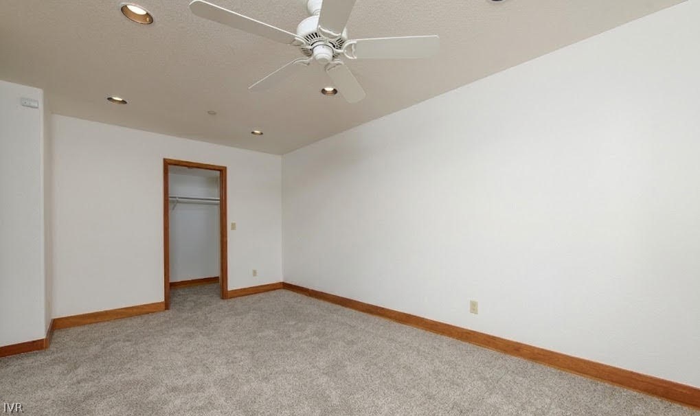 400 Fairview Boulevard, Unit 162 Incline Village, NV 89451 - Photo 40 of 50 an empty room with a ceiling fan and a window