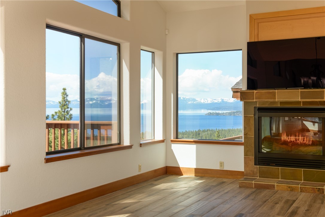400 Fairview Boulevard, Unit 162 Incline Village, NV 89451 - Photo 9 of 50 a view of an empty room with a flat screen tv and a floor to ceiling window