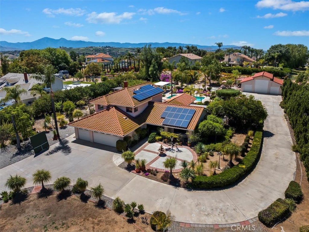 16585 Suttles Drive Riverside, CA 92504 - Photo 1 of 1 a view of a swimming pool and lounge chair
