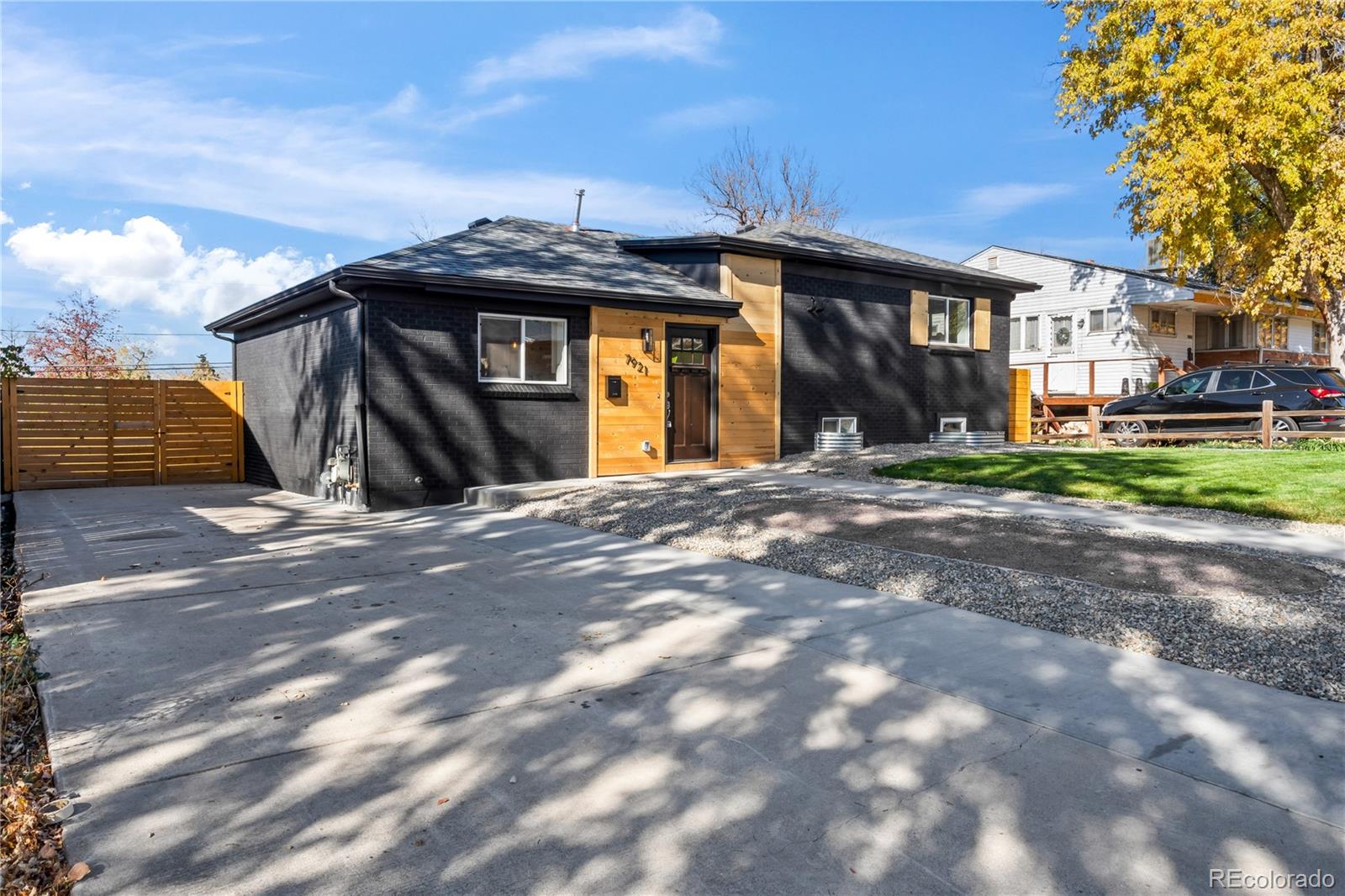 a view of a house with a yard