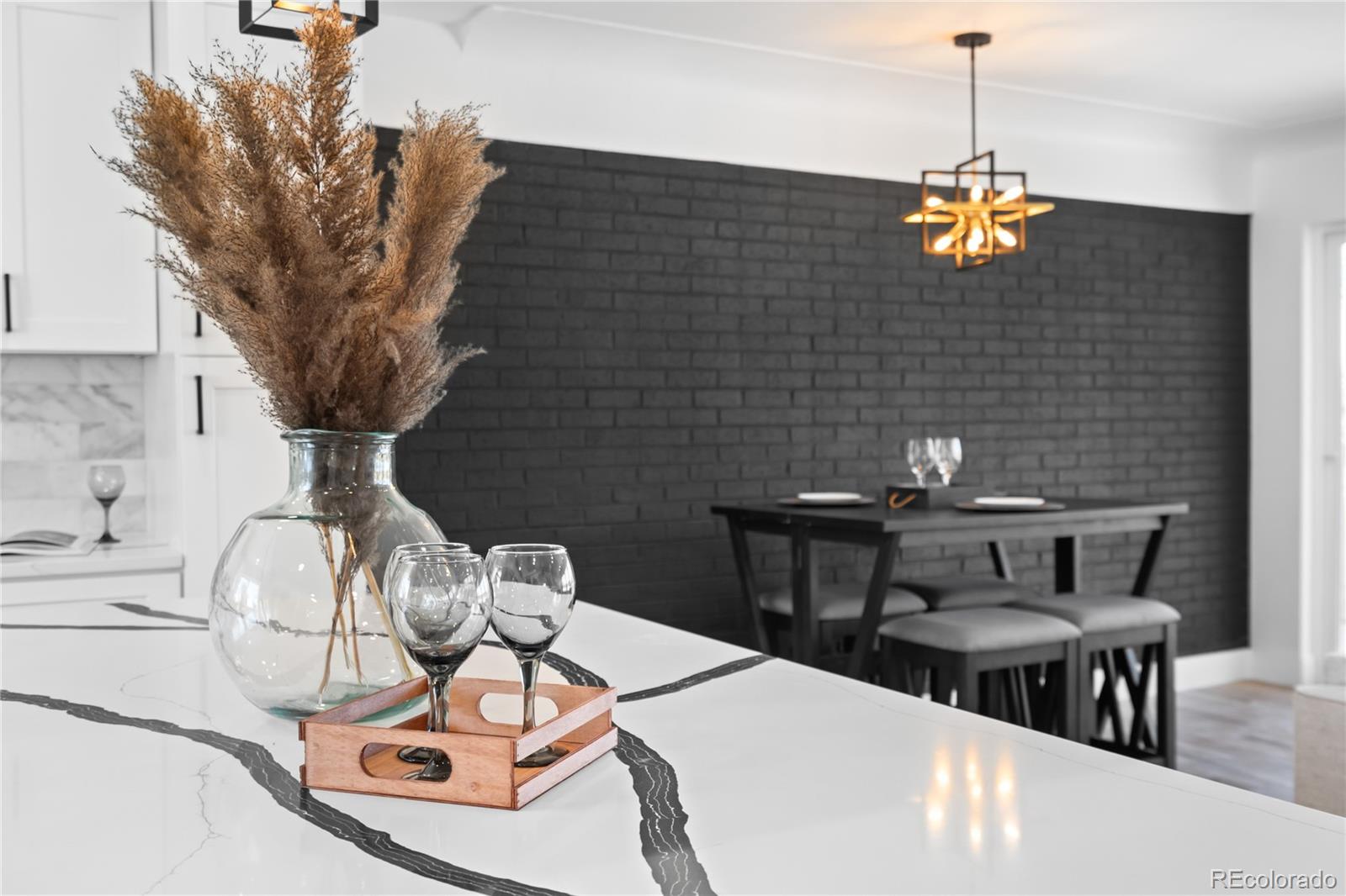 7921 Raleigh Street Westminster, CO 80030 - Photo 17 of 43 a vase of flowers sitting on a table