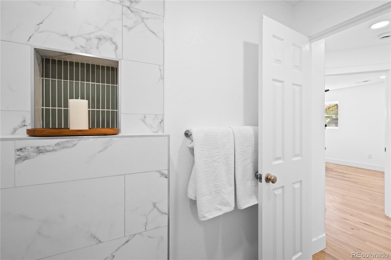7921 Raleigh Street Westminster, CO 80030 - Photo 22 of 43 a view of a bathroom with a sink
