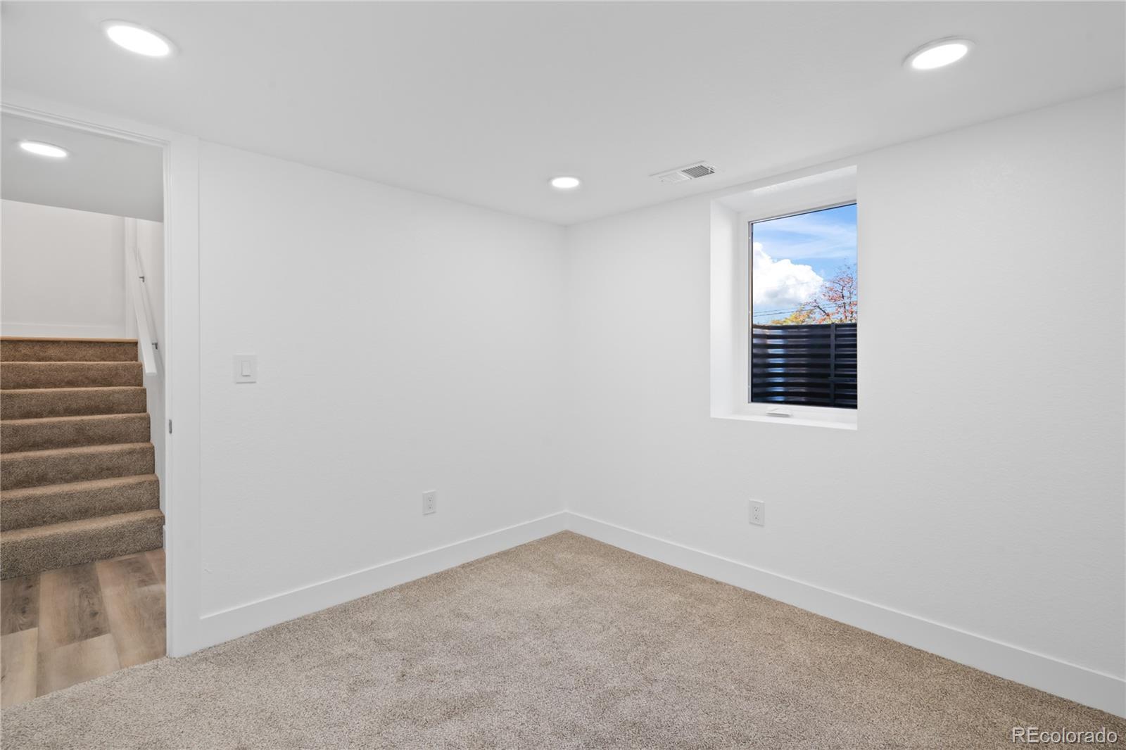 7921 Raleigh Street Westminster, CO 80030 - Photo 39 of 43 a view of an empty room