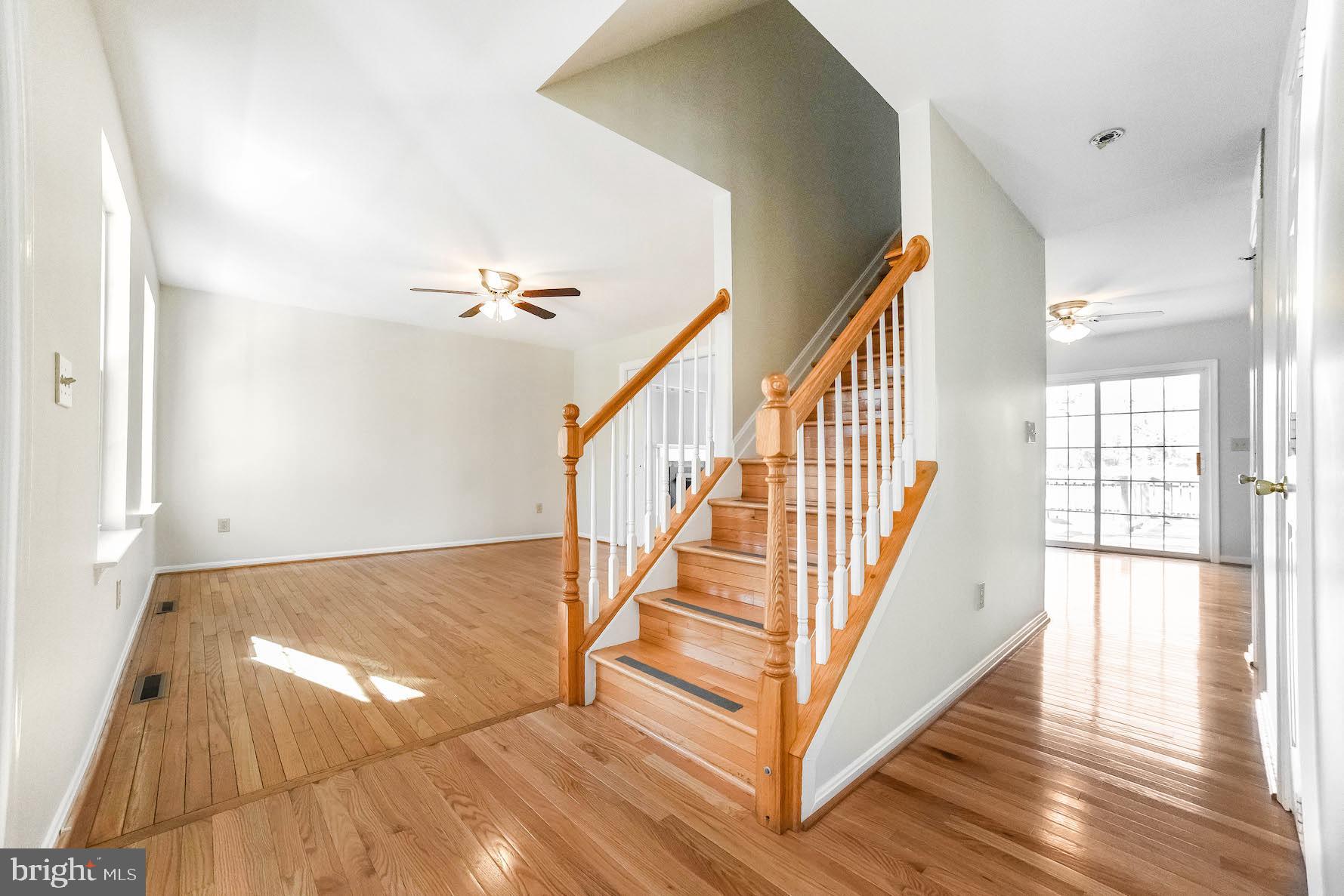 11211 Rawhide Road Lusby, MD 20657 - Photo 2 of 40 Gleaming hardwood greets you in the foyer