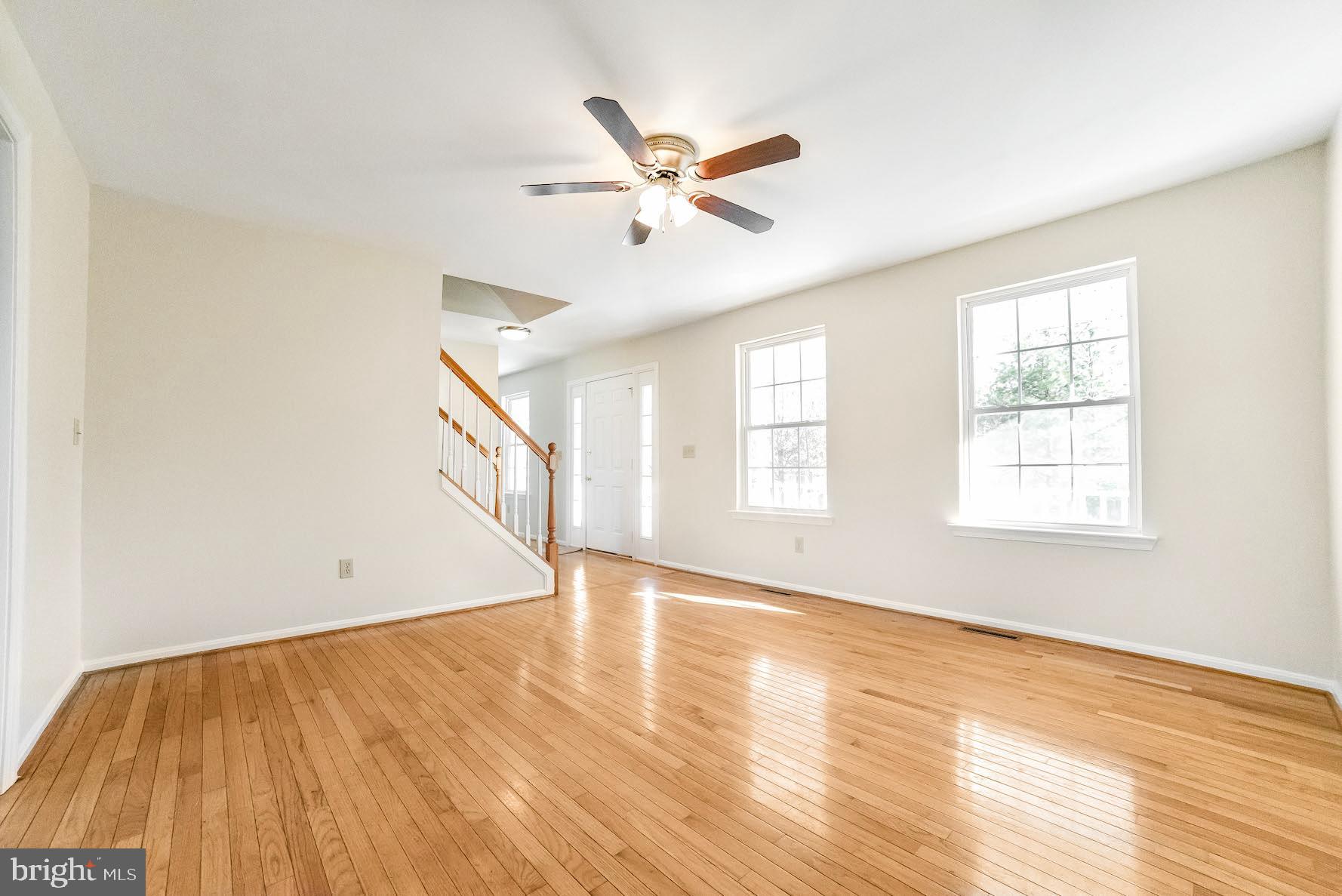 11211 Rawhide Road Lusby, MD 20657 - Photo 14 of 40 Living room with natural light