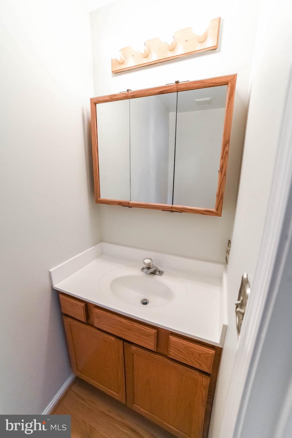 11211 Rawhide Road Lusby, MD 20657 - Photo 26 of 40 Main floor half bath for guests