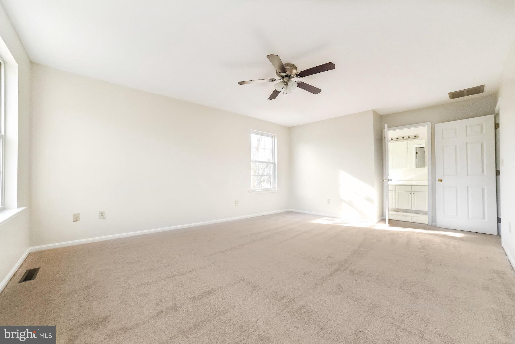 11211 Rawhide Road Lusby, MD 20657 - Photo 27 of 40 Master bedroom with attached bath