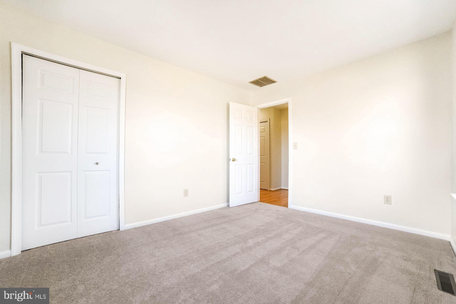 11211 Rawhide Road Lusby, MD 20657 - Photo 36 of 40 Bedroom 3. Home has convenient upstairs laundry rm