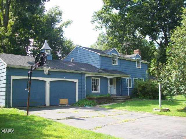 17 Edgewood Road Oxford, CT 06478 - Photo 1 of 1 a front view of a house with a yard