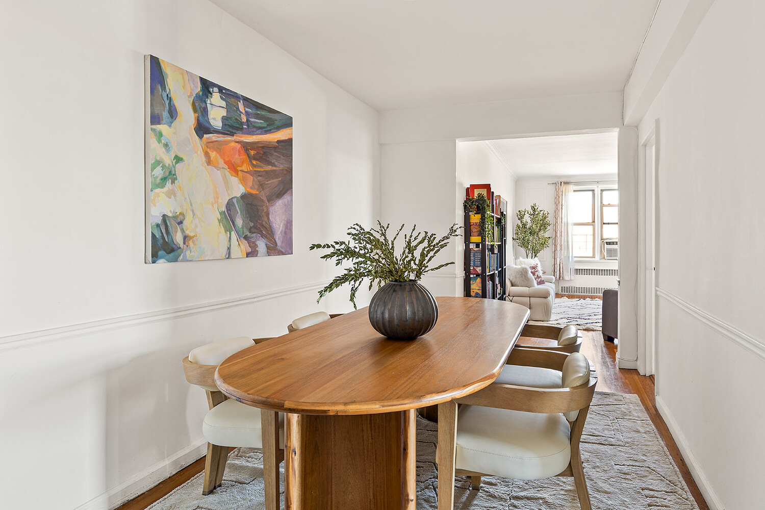 9425 Shore Road, Unit 6C Brooklyn, NY 11209 - Photo 3 of 9 a view of a dining room with furniture and wooden floor