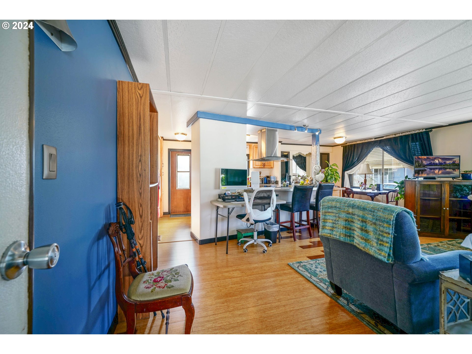 3457 Rainbow Loop Hubbard, OR 97032 - Photo 25 of 32 a living room with furniture and a wooden floor