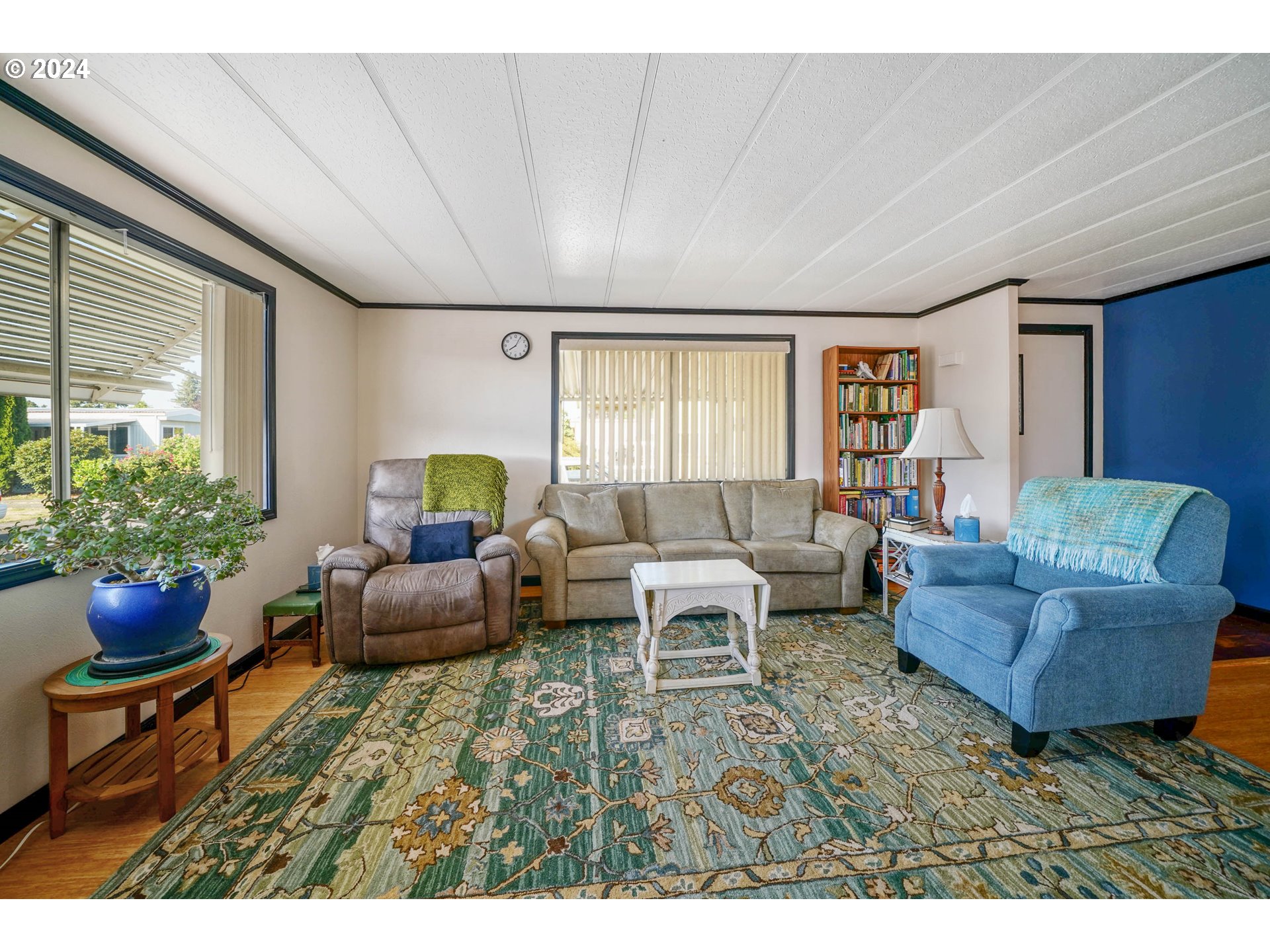 3457 Rainbow Loop Hubbard, OR 97032 - Photo 28 of 32 a living room with furniture and a potted plant