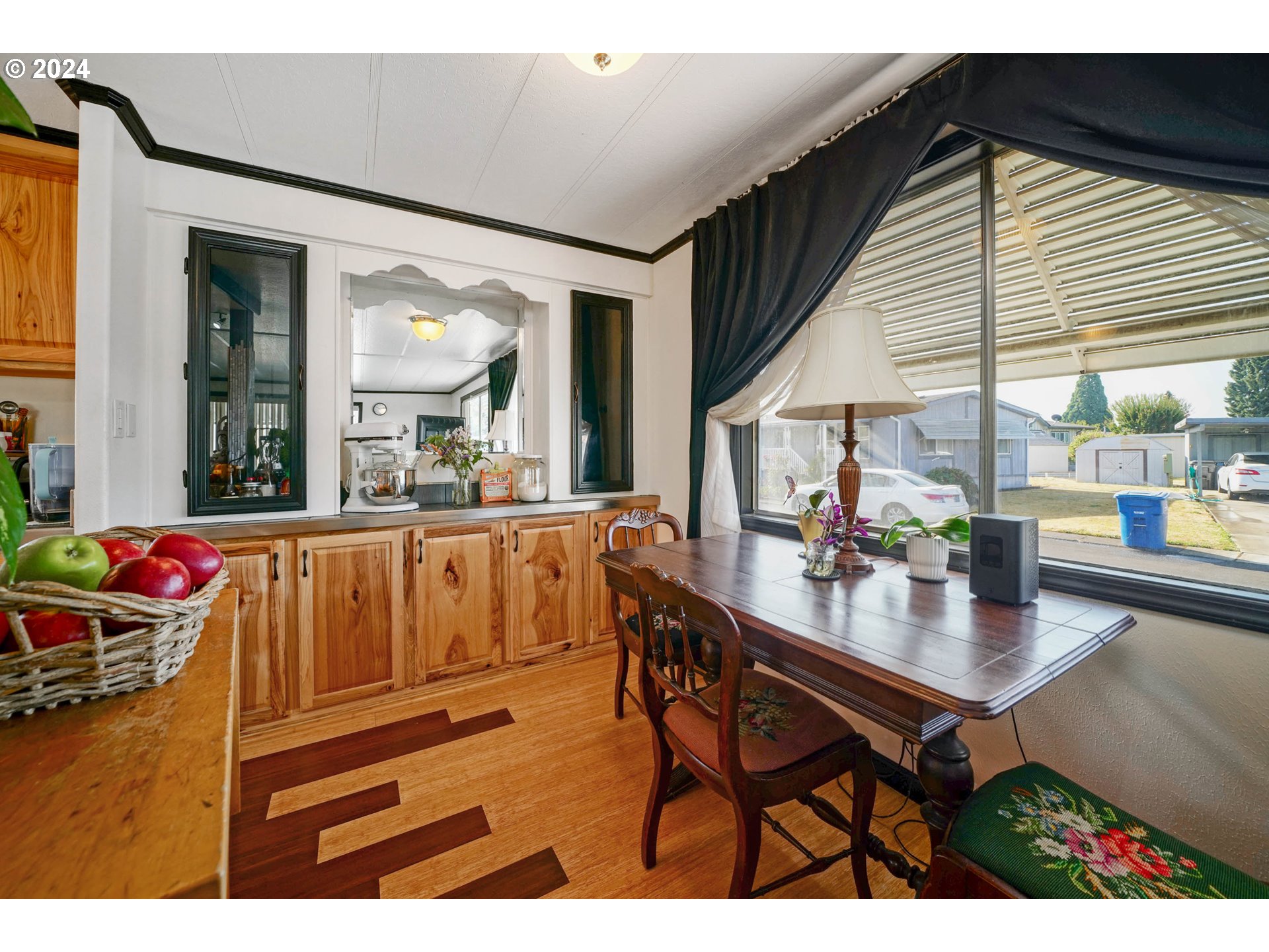 3457 Rainbow Loop Hubbard, OR 97032 - Photo 7 of 32 a dinning table and chairs in the balcony