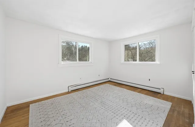 an empty room with windows