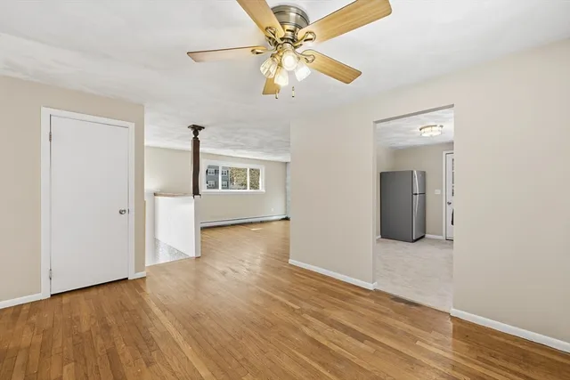 a view of entryway with wooden floor