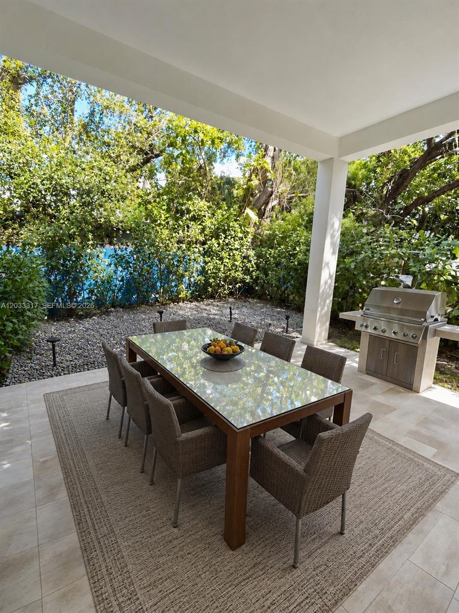 37 Northwest 70th Street, Unit B Miami, FL 33150 - Photo 14 of 17 Patio Virtually Staged