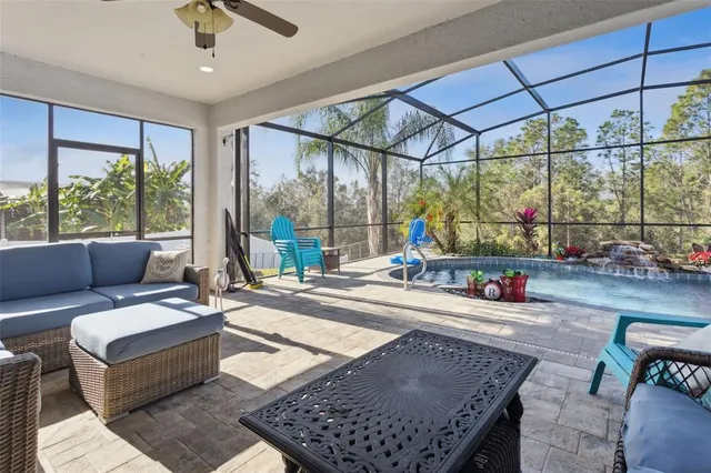 a view of a swimming pool with a patio