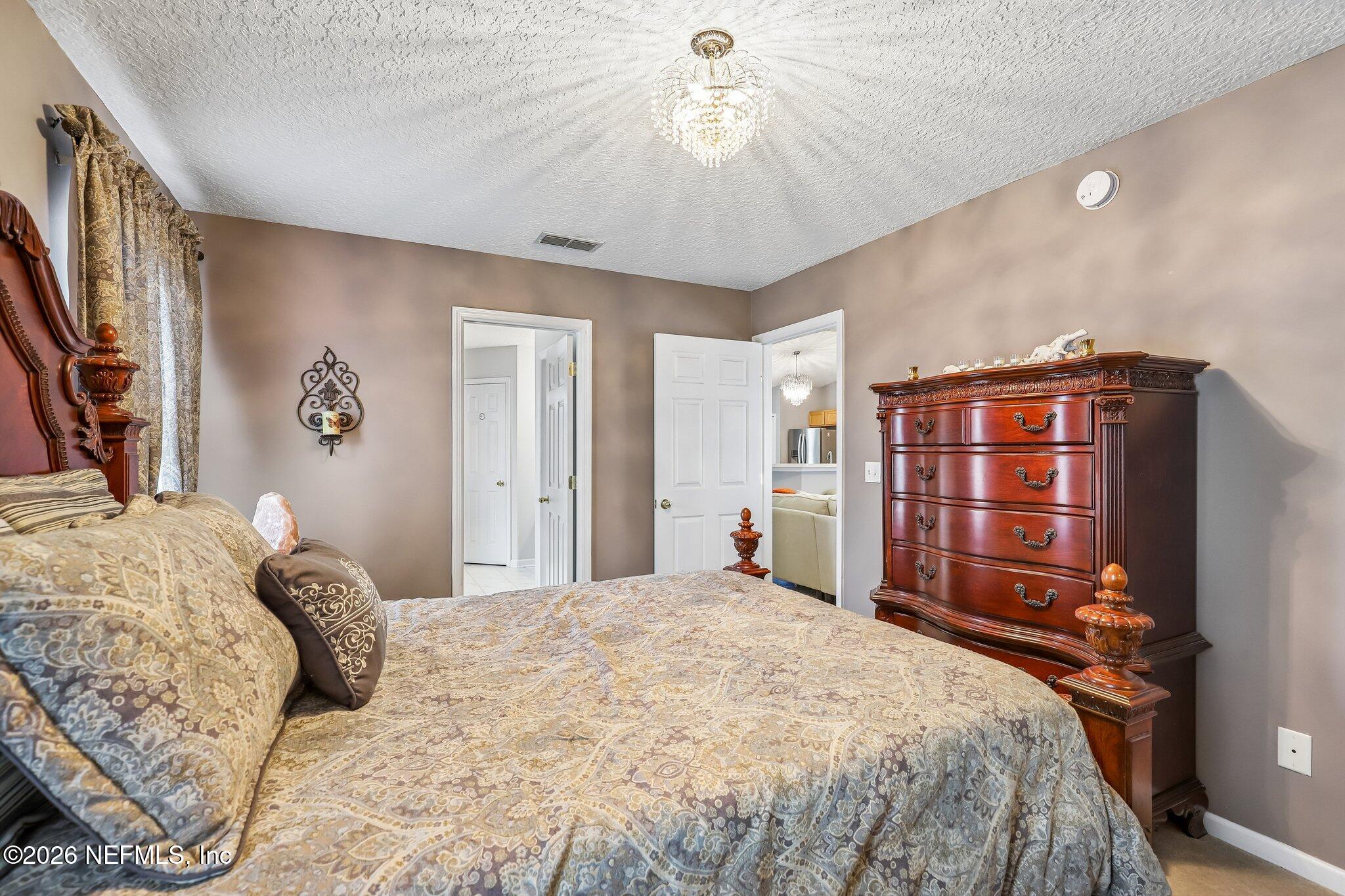 11541 Saints Road Jacksonville, FL 32246 - Photo 18 of 29 Primary Bedroom