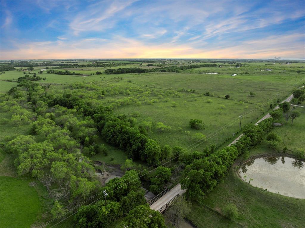 7 7 Mile Lane Riesel, TX 76682 - Photo 3 of 17 Aerial view at dusk with a rural view