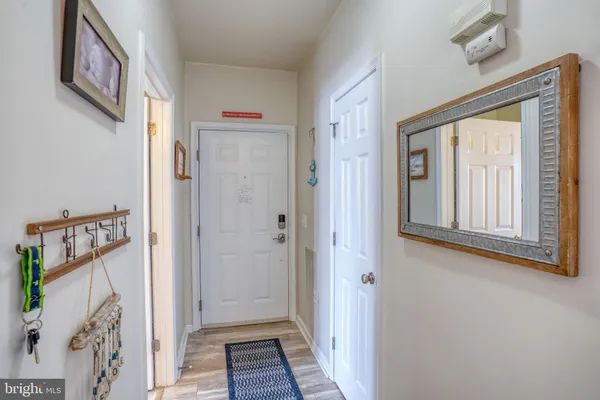 a view of a hallway with entryway