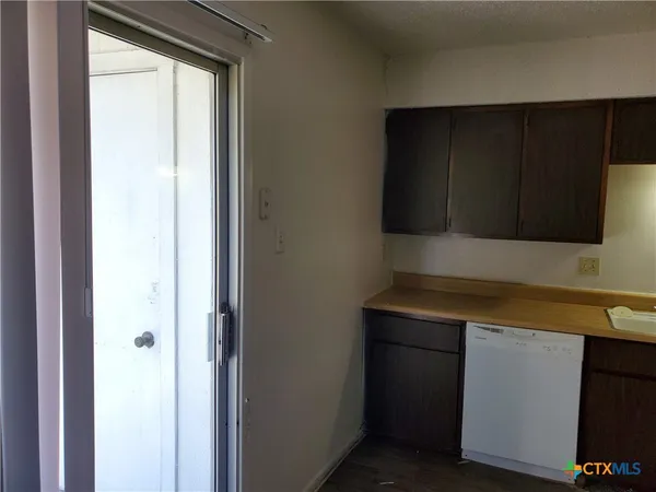 a room with storage and utility