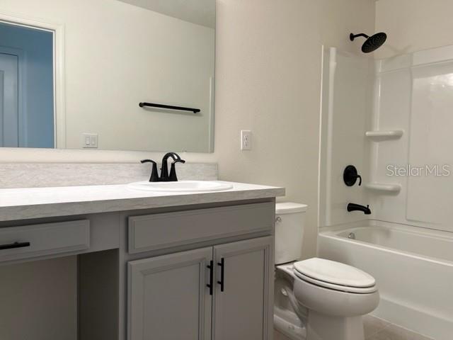 2792 Mdw Strm Way Clermont, FL 34714 - Photo 12 of 20 a bathroom with a sink toilet and shower