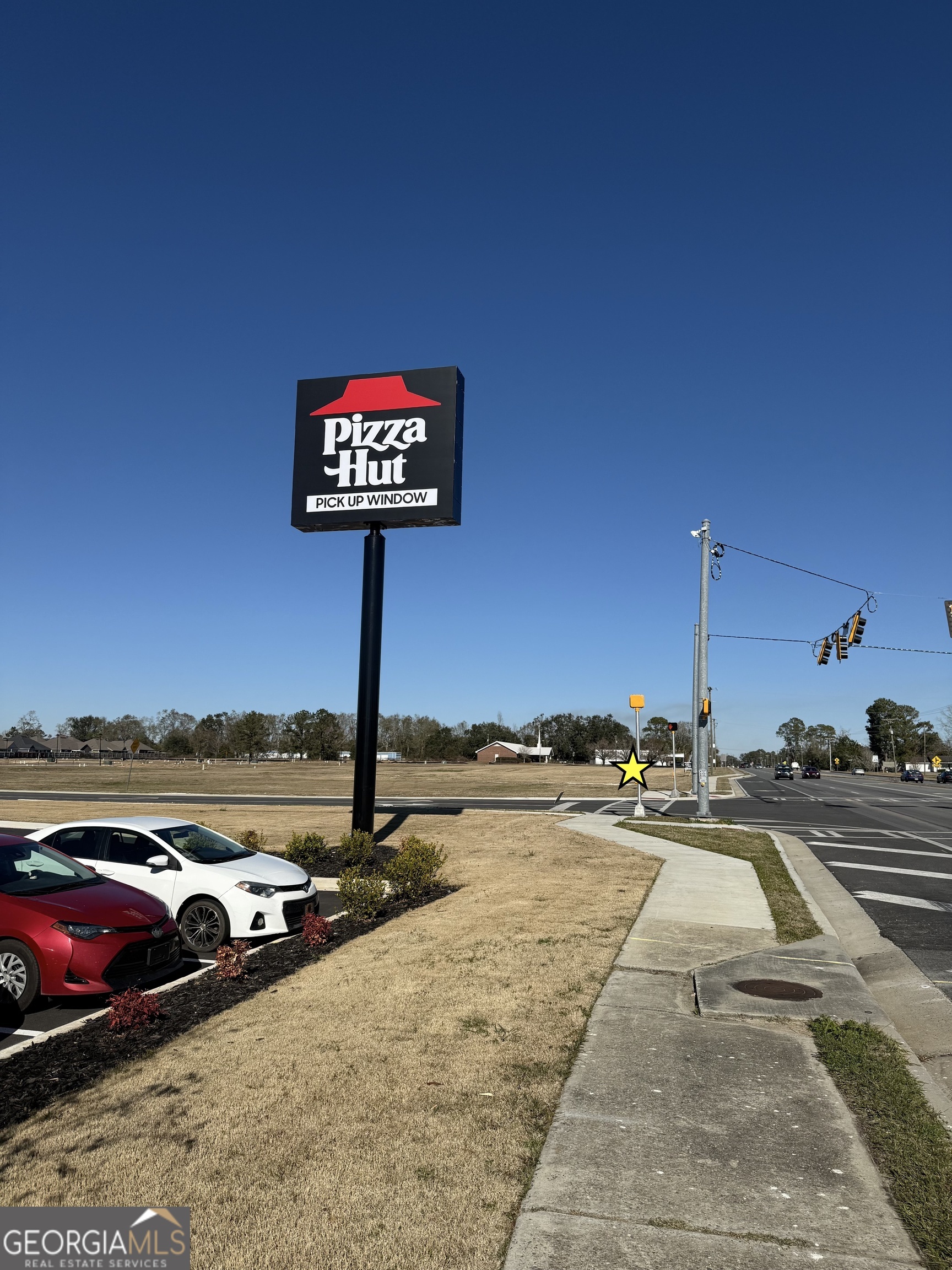 4475 Bemiss Road Valdosta, GA 31605 - Photo 1 of 12 a view of a street with an ocean view
