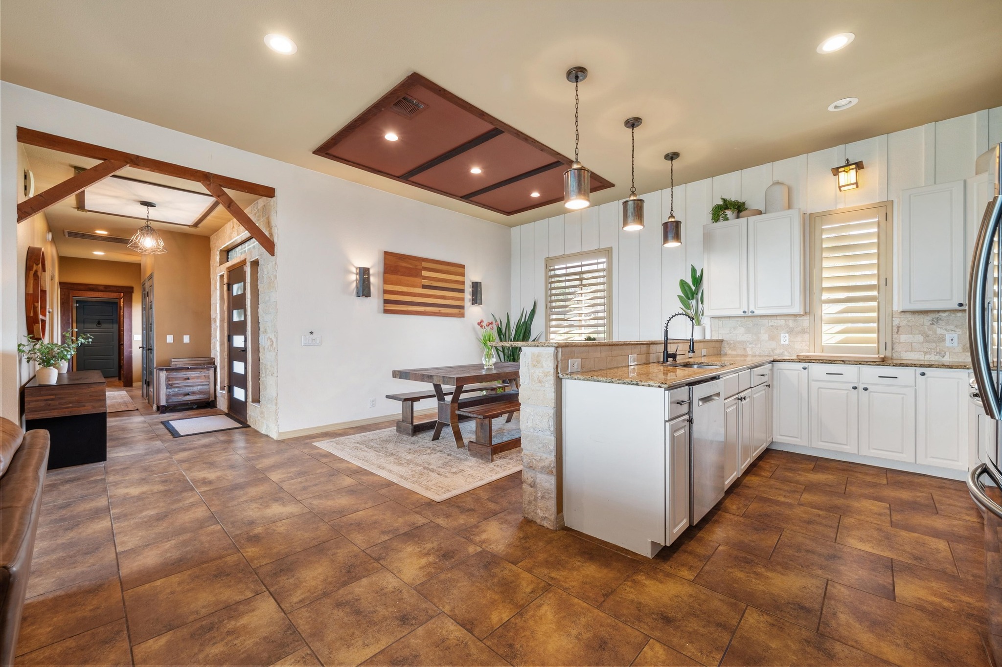 13602 Couri Pass Austin, TX 78738 - Photo 15 of 36 a large white kitchen with a large window