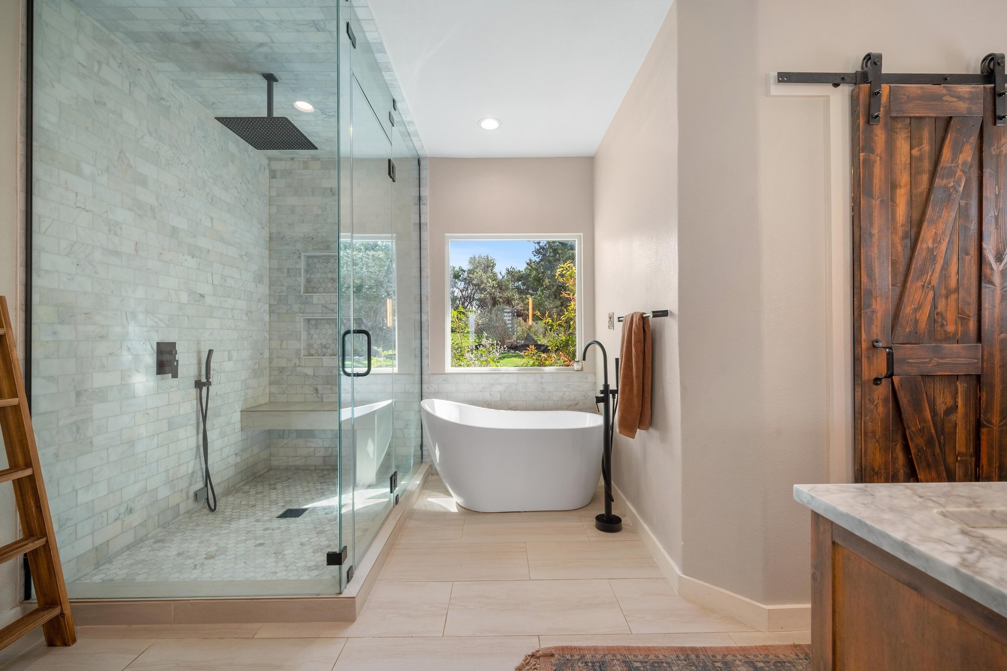 13602 Couri Pass Austin, TX 78738 - Photo 22 of 36 a bathroom with a granite countertop bathtub shower and toilet