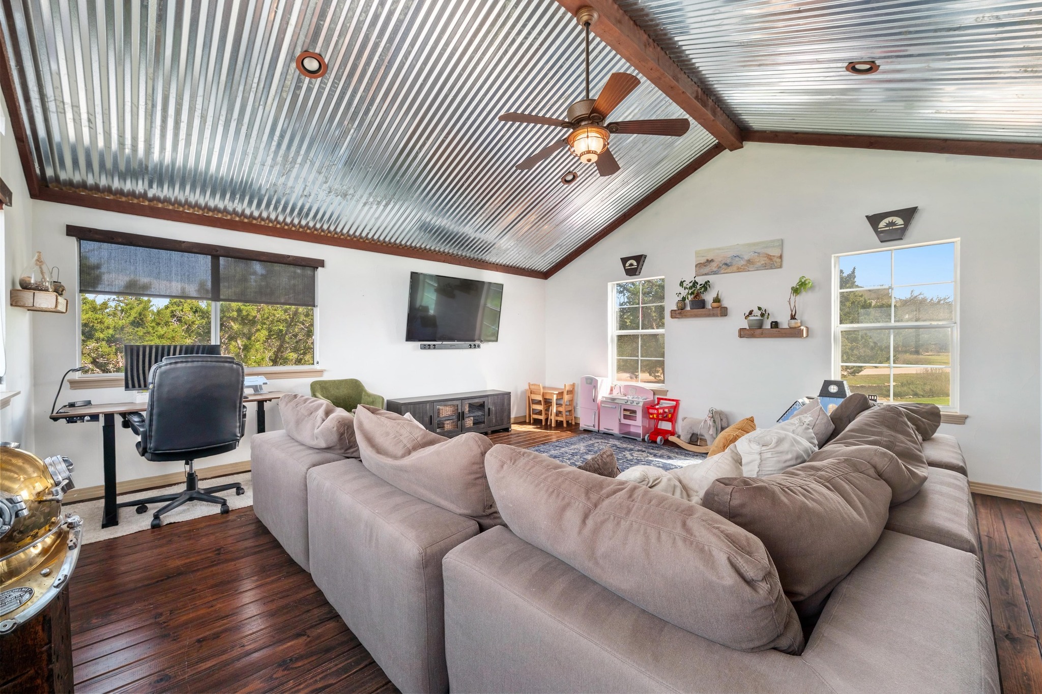 13602 Couri Pass Austin, TX 78738 - Photo 25 of 36 a living room with furniture and a large window