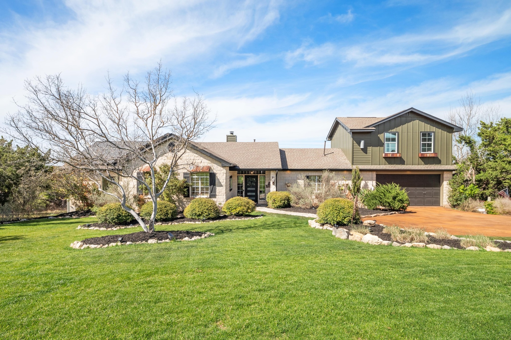 13602 Couri Pass Austin, TX 78738 - Photo 4 of 36 a front view of a house with a yard