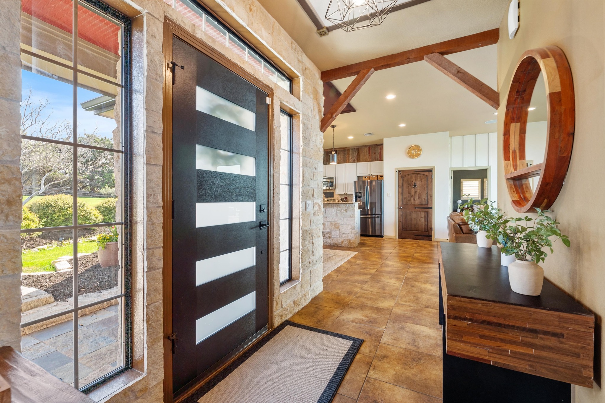 13602 Couri Pass Austin, TX 78738 - Photo 8 of 36 a lobby with furniture and potted plant