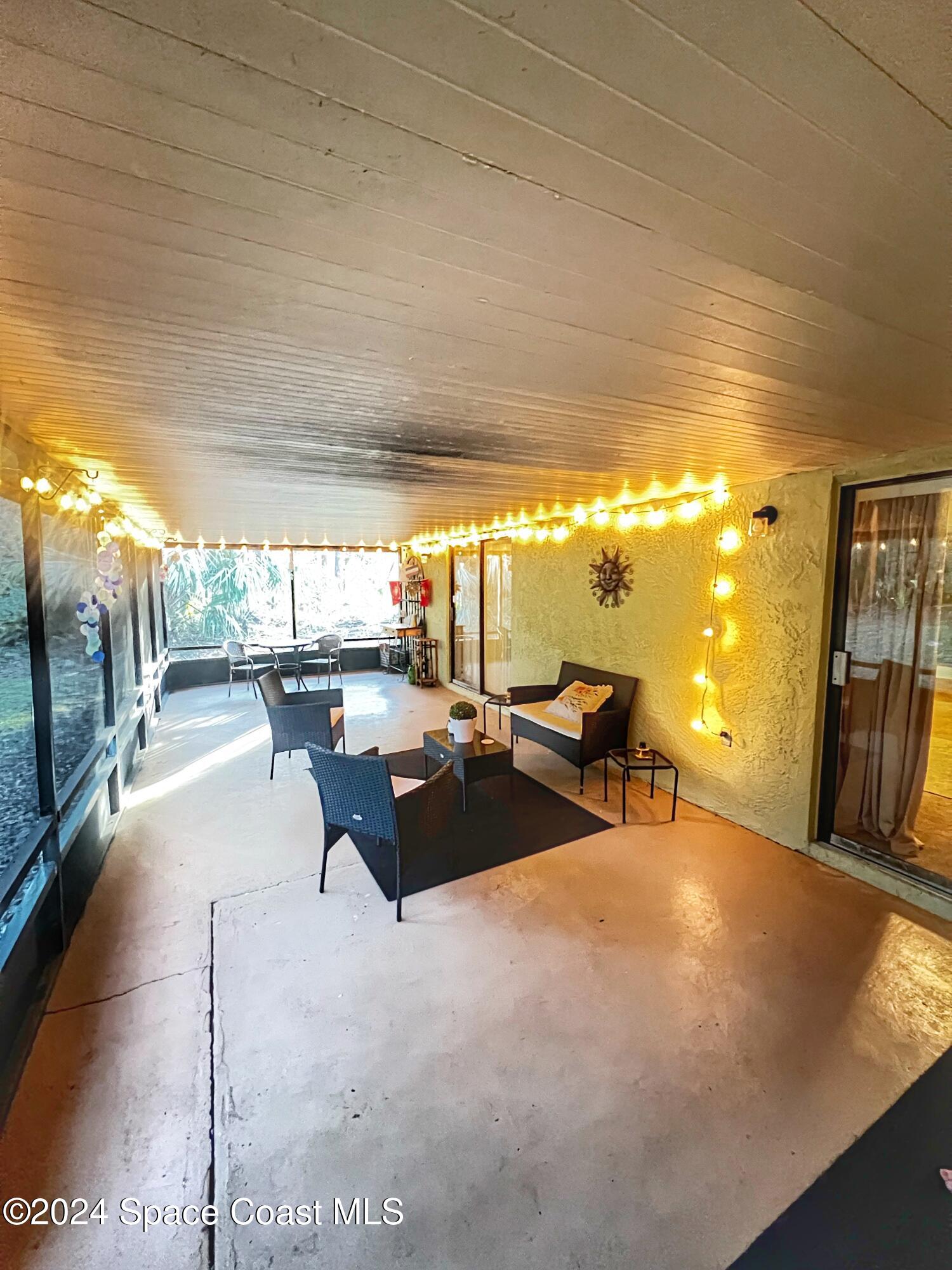 5915 Sisson Road Titusville, FL 32780 - Photo 21 of 23 Right - patio
