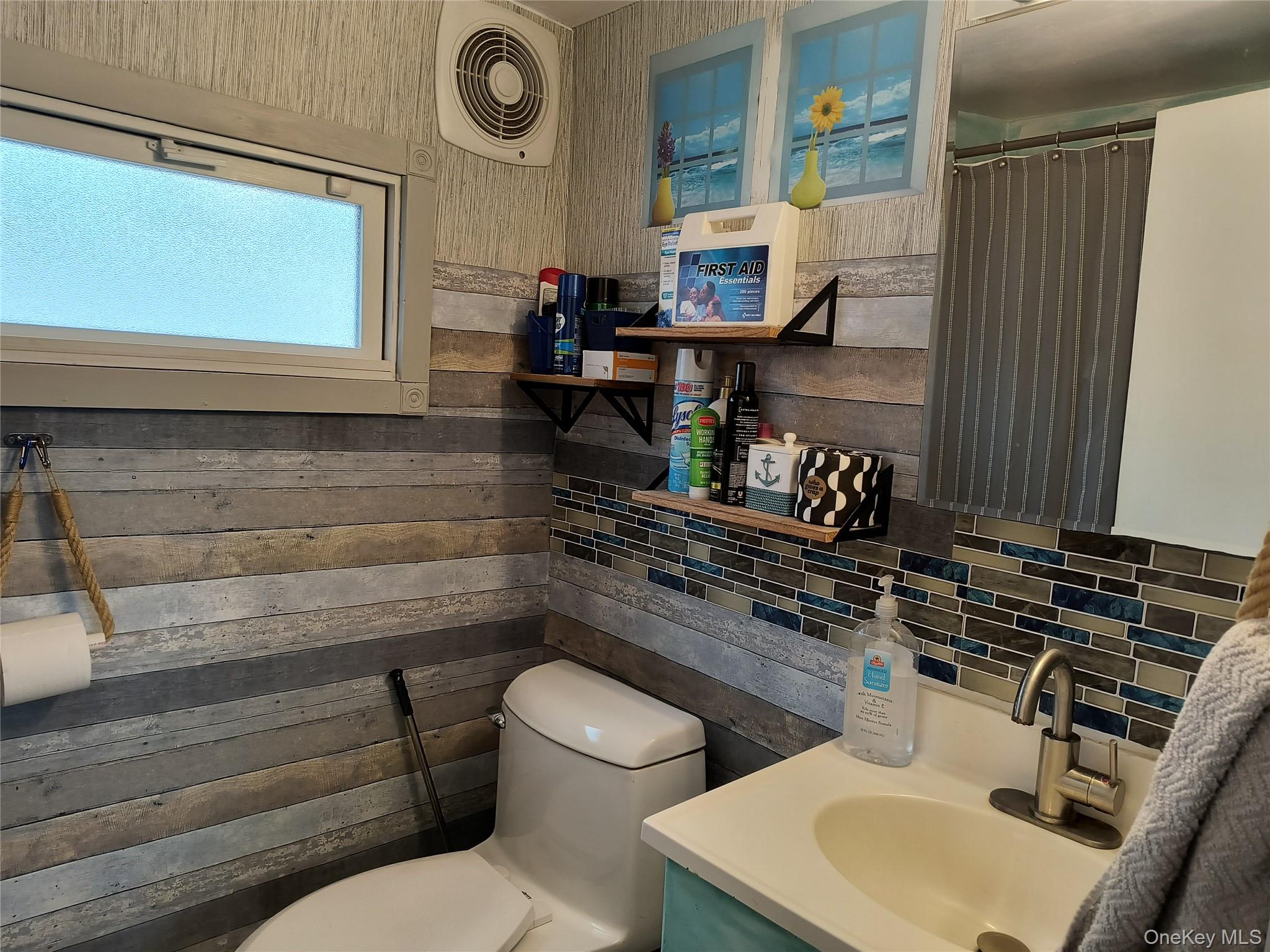 20 Barron Road Montgomery, NY 12549 - Photo 10 of 30 a bathroom with a toilet sink and mirror