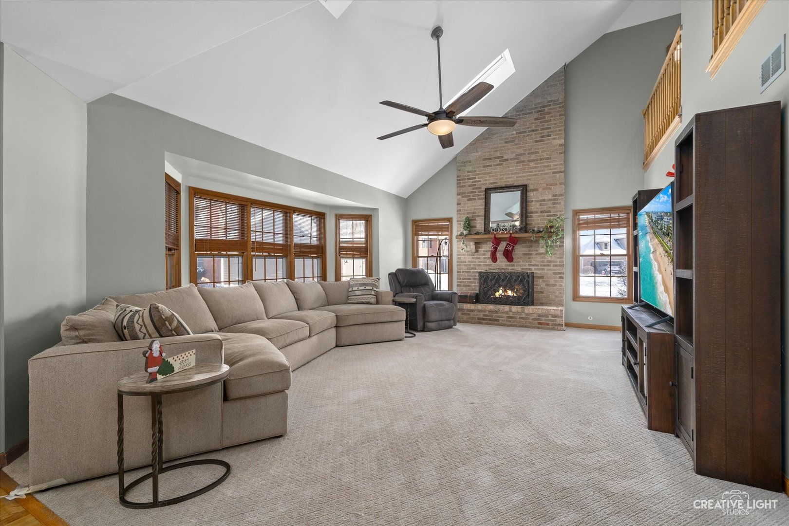 1135 Conan Doyle Road Naperville, IL 60564 - Photo 12 of 47 a living room with furniture and a window