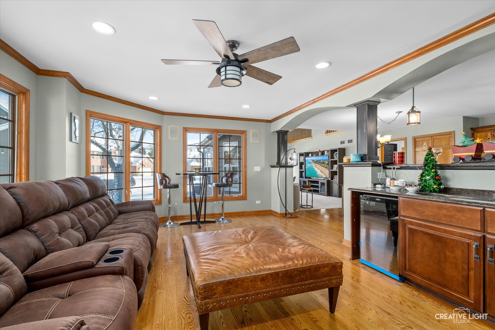 1135 Conan Doyle Road Naperville, IL 60564 - Photo 15 of 47 a living room with furniture and a large window
