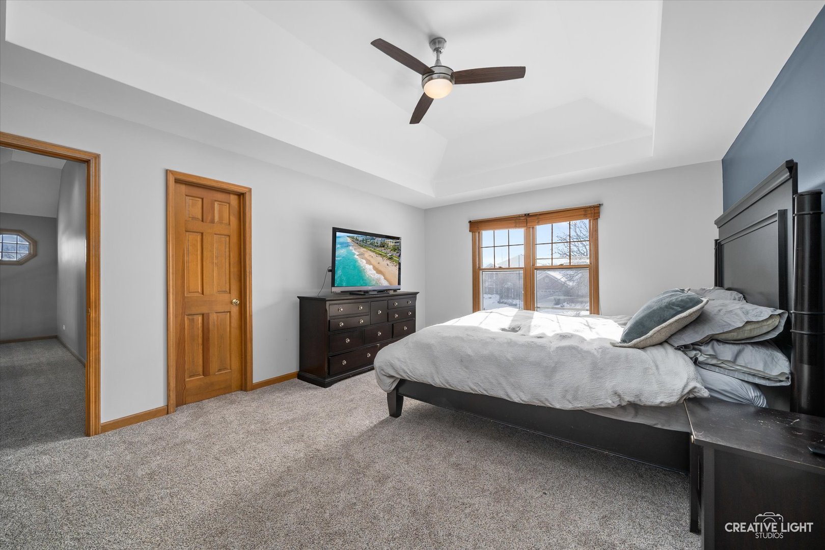 1135 Conan Doyle Road Naperville, IL 60564 - Photo 18 of 47 a bed room with a bed and a television