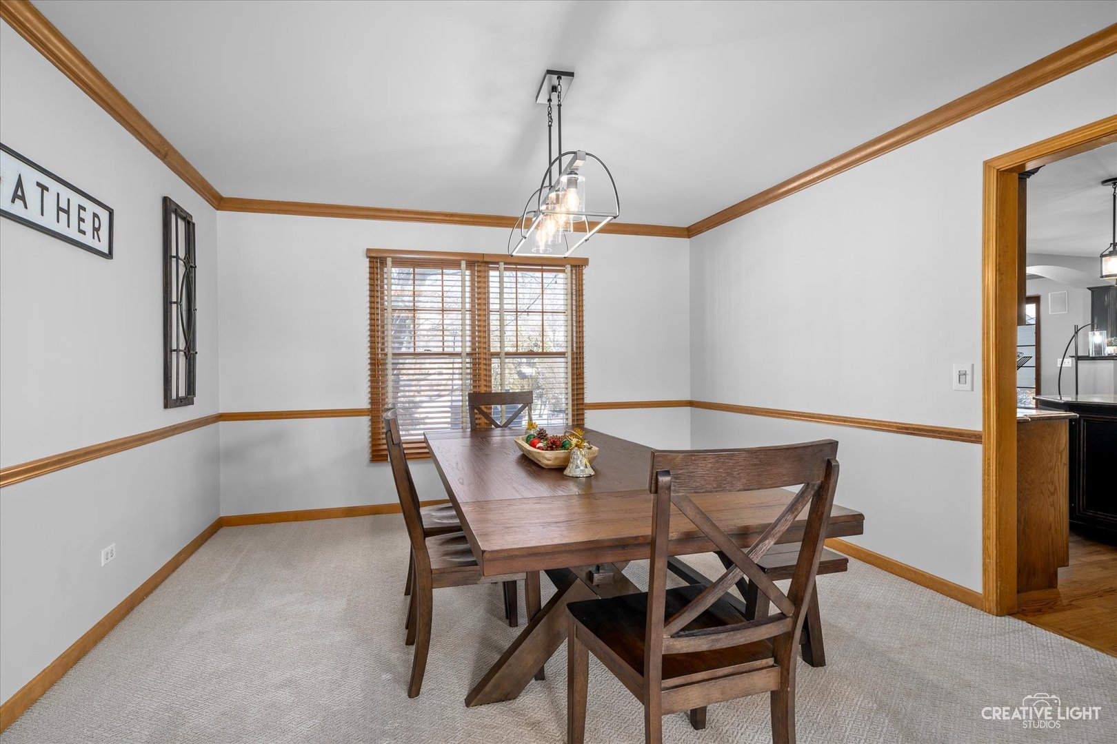 1135 Conan Doyle Road Naperville, IL 60564 - Photo 8 of 47 a view of a dining room with furniture and window