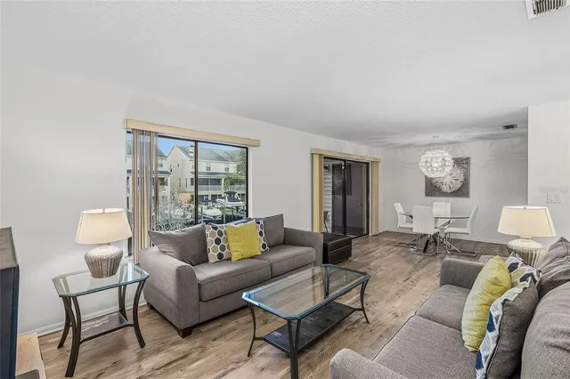 a view of a balcony with chairs