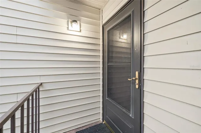 a kitchen with stainless steel appliances a stove a microwave and a refrigerator