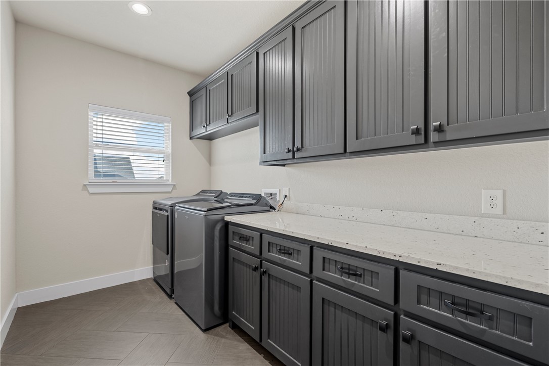 848 Gallant Fox Hewitt, TX 76643 - Photo 15 of 32 a kitchen with stainless steel appliances granite countertop a sink stove and cabinets