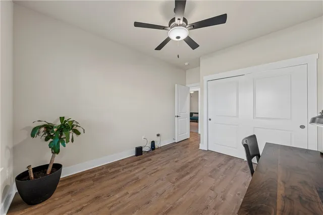 a view of a room with a potted plant