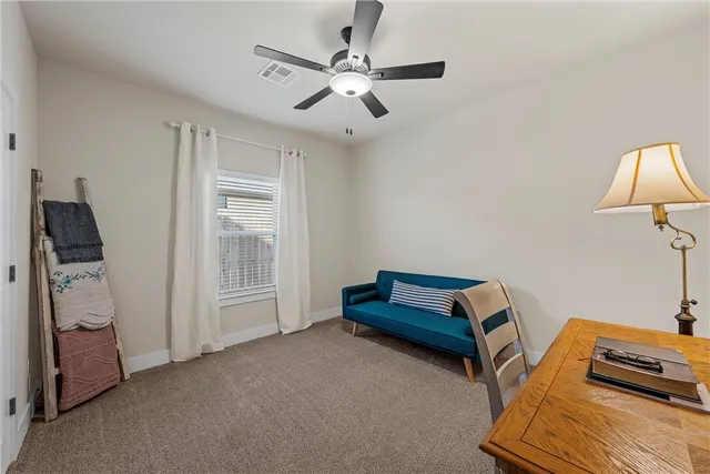 a room with furniture and a window