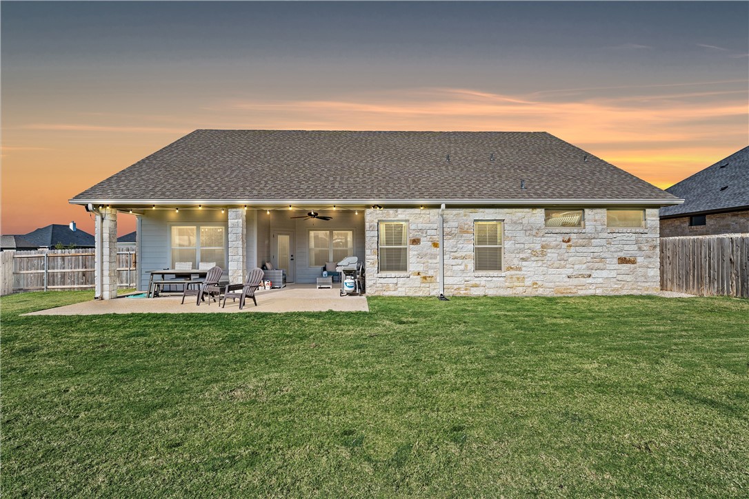 848 Gallant Fox Hewitt, TX 76643 - Photo 29 of 32 a front view of a house with a garden and porch