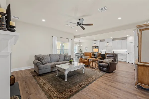 a living room with furniture and a rug