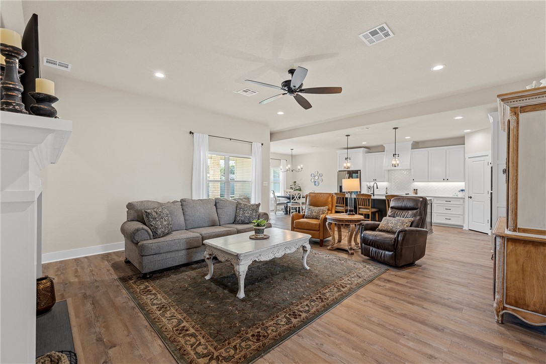 848 Gallant Fox Hewitt, TX 76643 - Photo 6 of 32 a living room with furniture and a rug