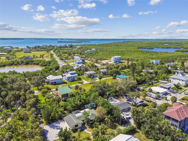 a view of an ocean and city