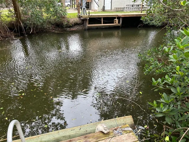 a view of a lake with a house