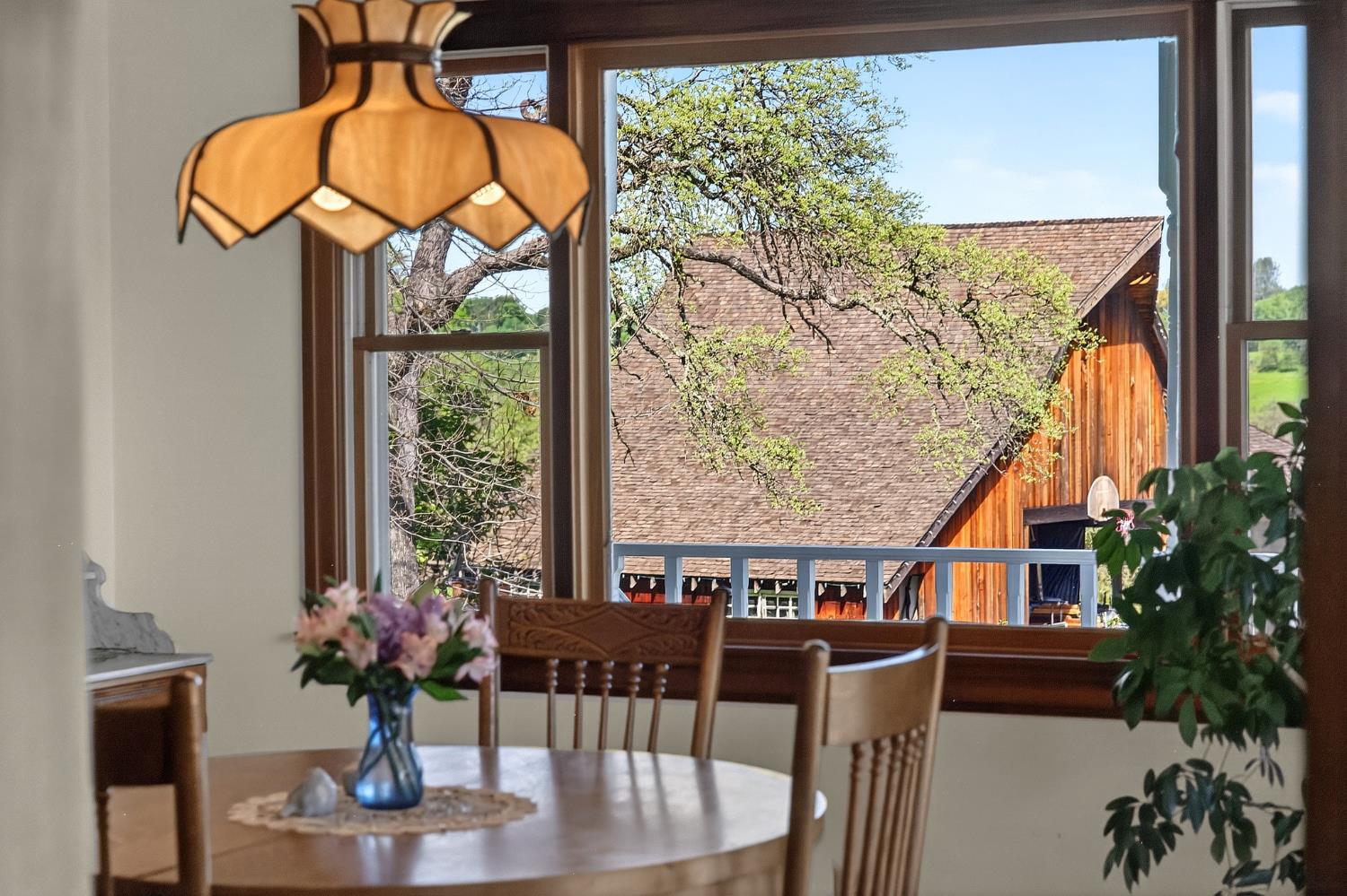 10800 Pickle Barrel Road Auburn, CA 95602 - Photo 16 of 82 a view of a dining room with furniture window and outside view