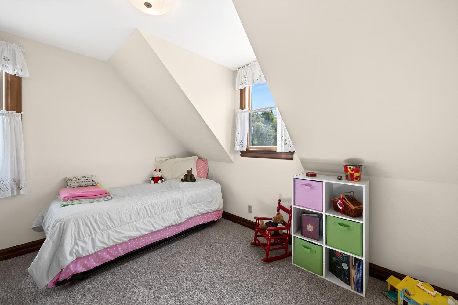 10800 Pickle Barrel Road Auburn, CA 95602 - Photo 29 of 82 a bedroom with a bed and a window